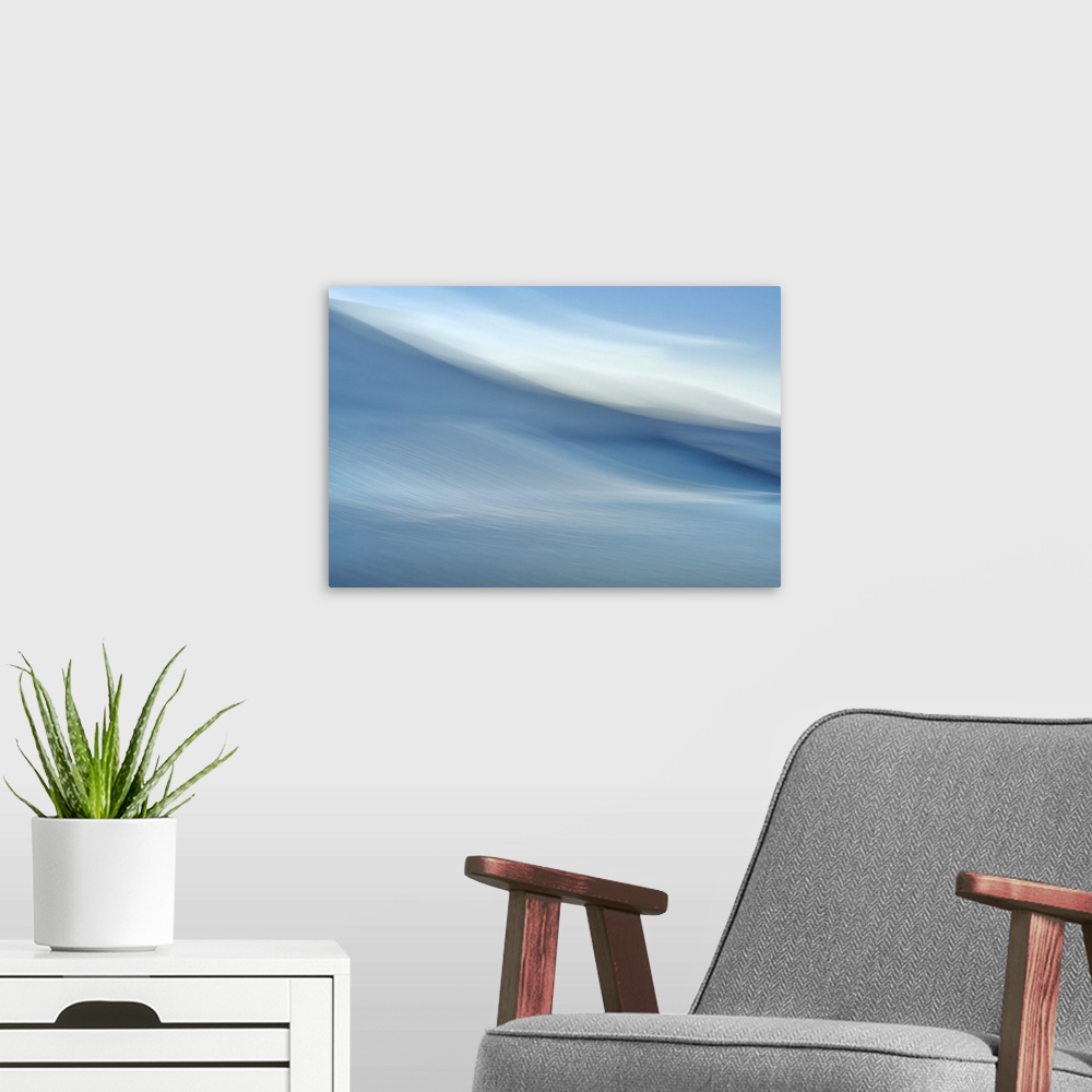 A modern room featuring Abstract image of a Pacific Northwest coastal view.