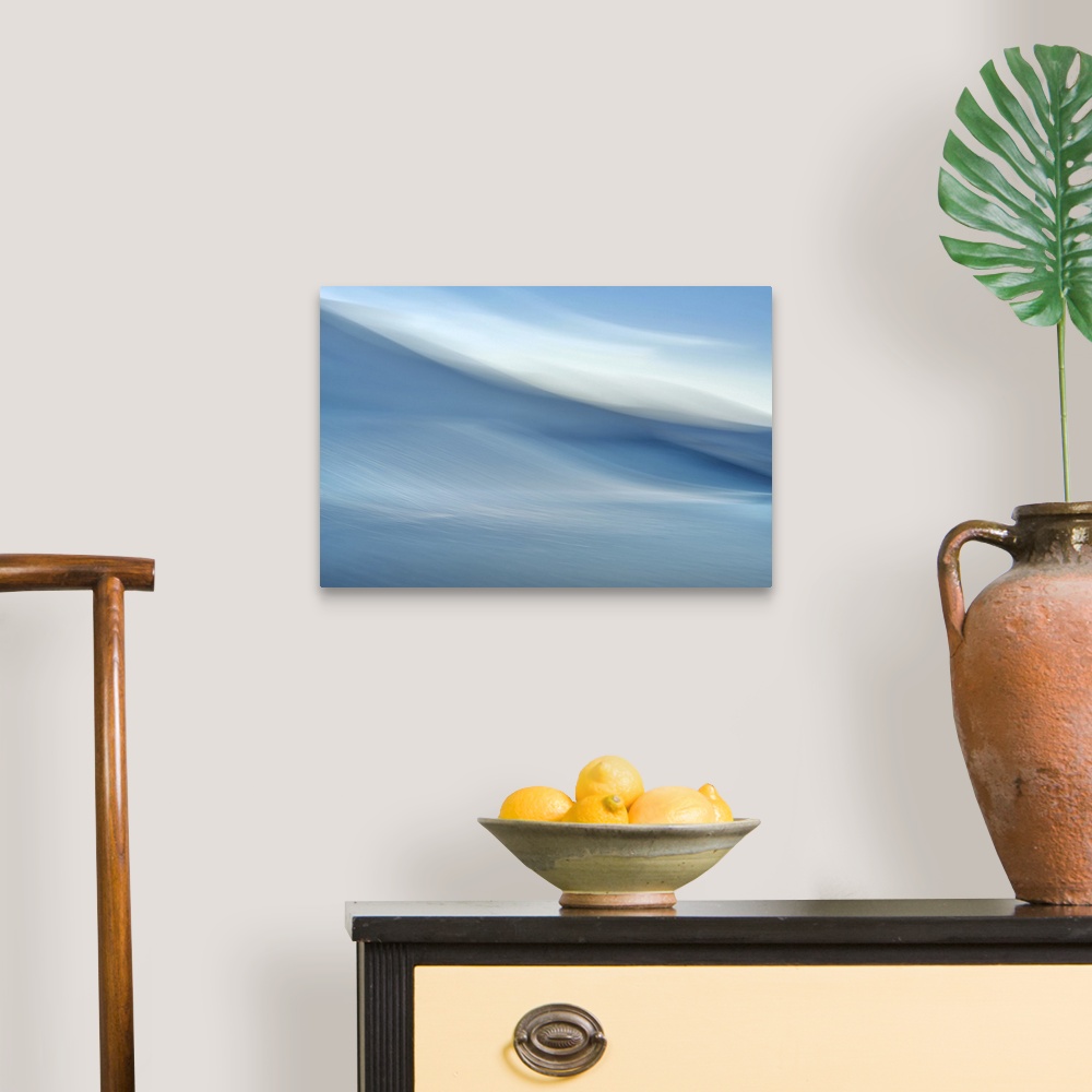 A traditional room featuring Abstract image of a Pacific Northwest coastal view.