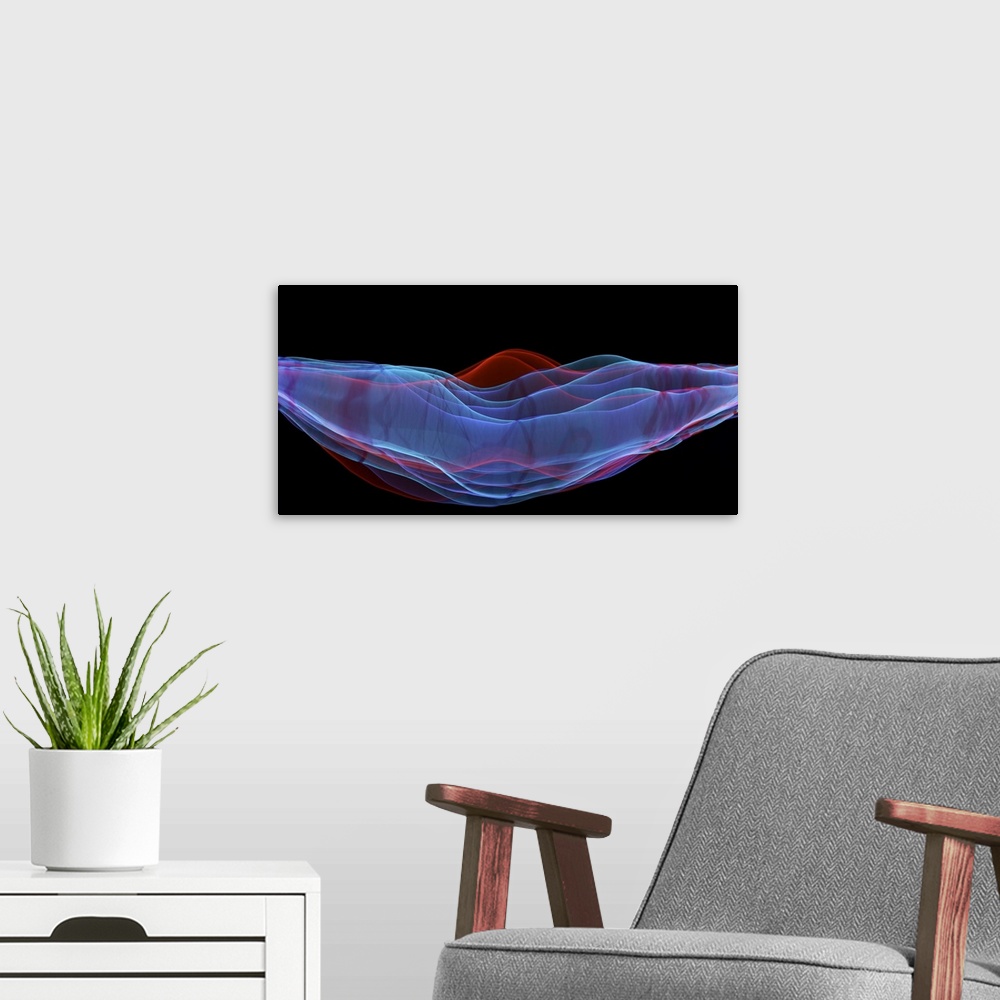 A modern room featuring A macro photograph of an abstract shape in multiple colors against a black background.