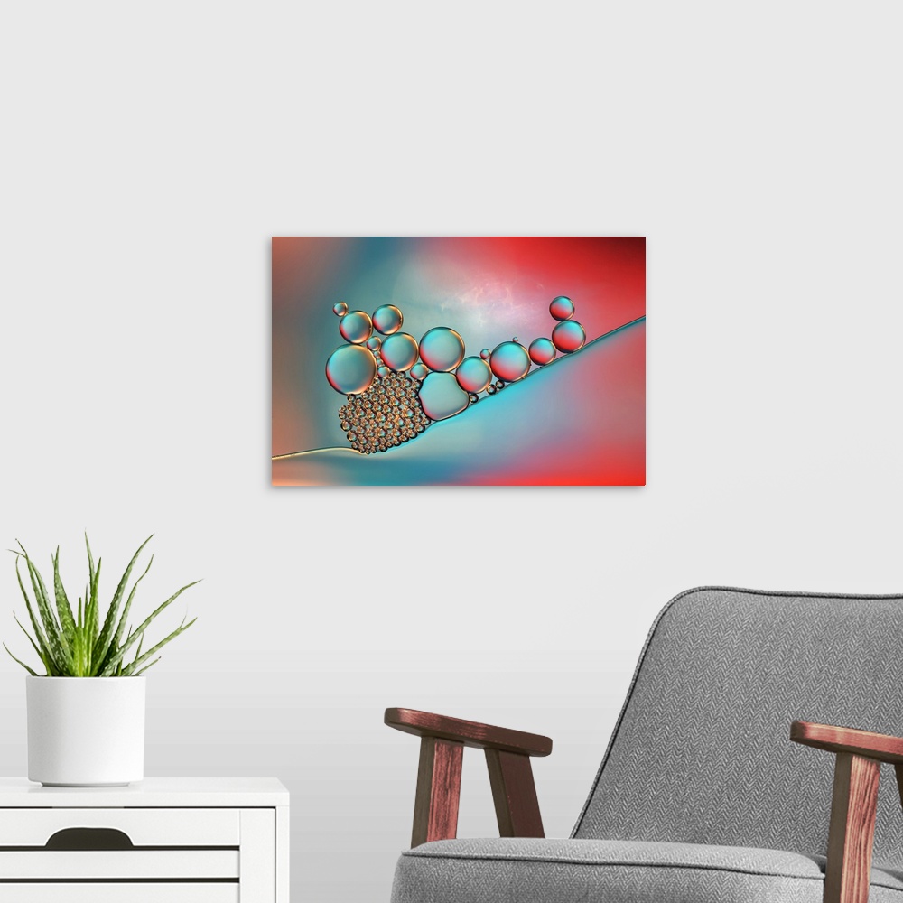 A modern room featuring A macro photograph of a cluster of bubbles against a colorful background.