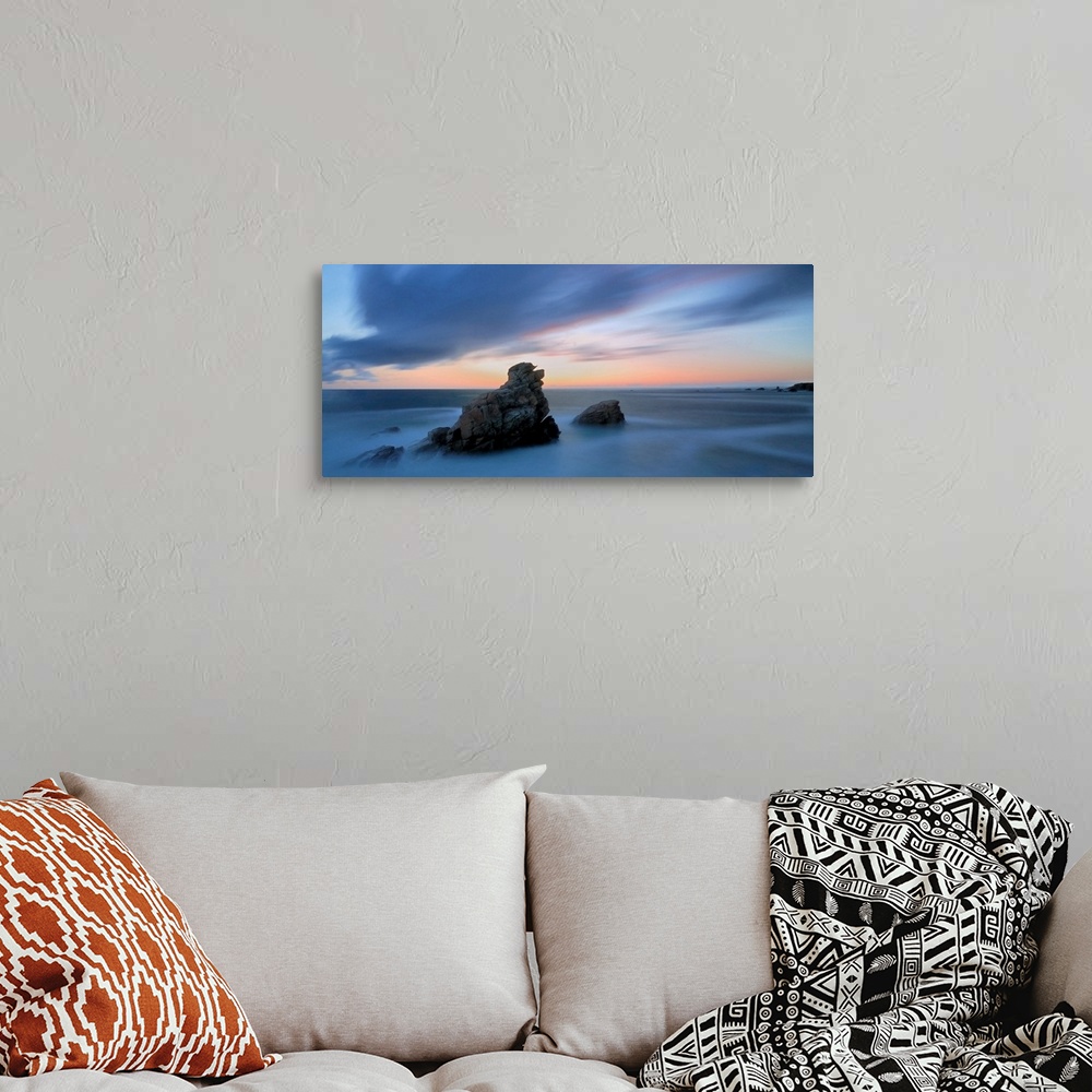 A bohemian room featuring Pink and blue sunset on a shorecoast in Brittany in France, Quiberon area called cote sauvage, du...