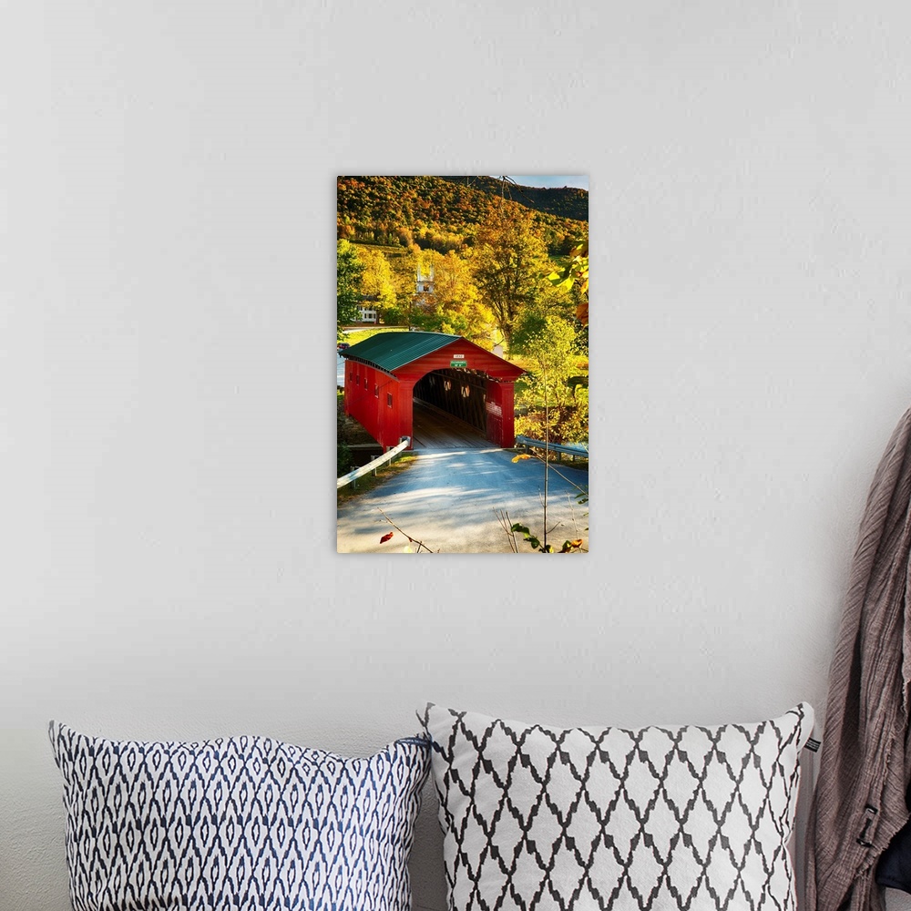 A bohemian room featuring Fine art photo of a red covered bridge in Vermont in the fall.