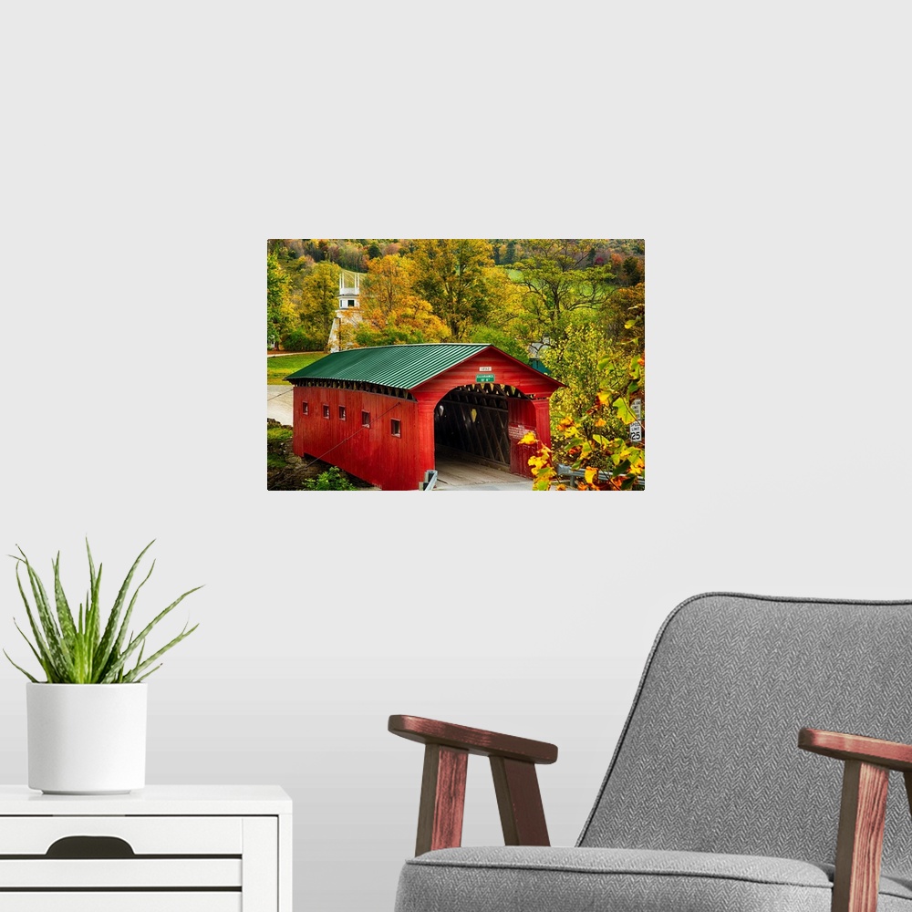 A modern room featuring Fine art photo of a red covered bridge in Vermont in the fall.