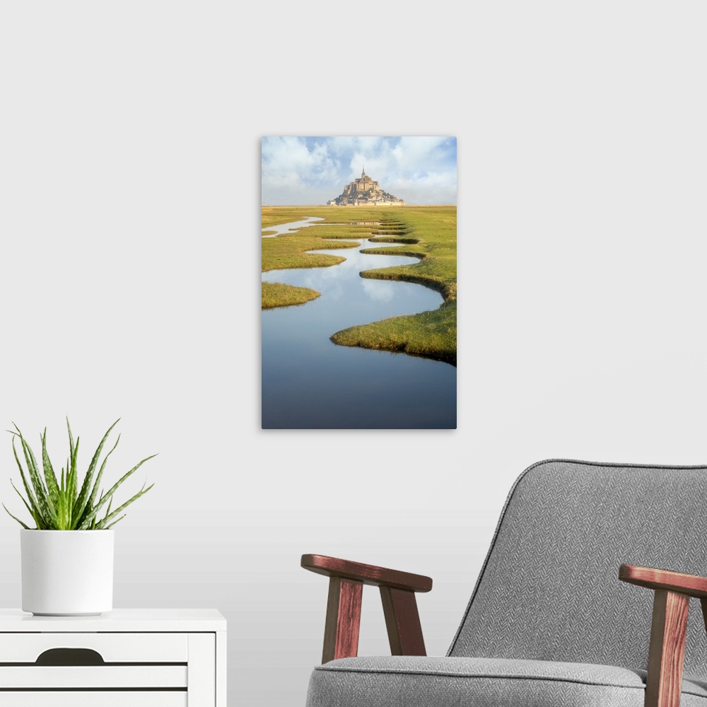 A modern room featuring Around Mont Saint Michel in France. After high tides, some nices water draws on the green lands c...