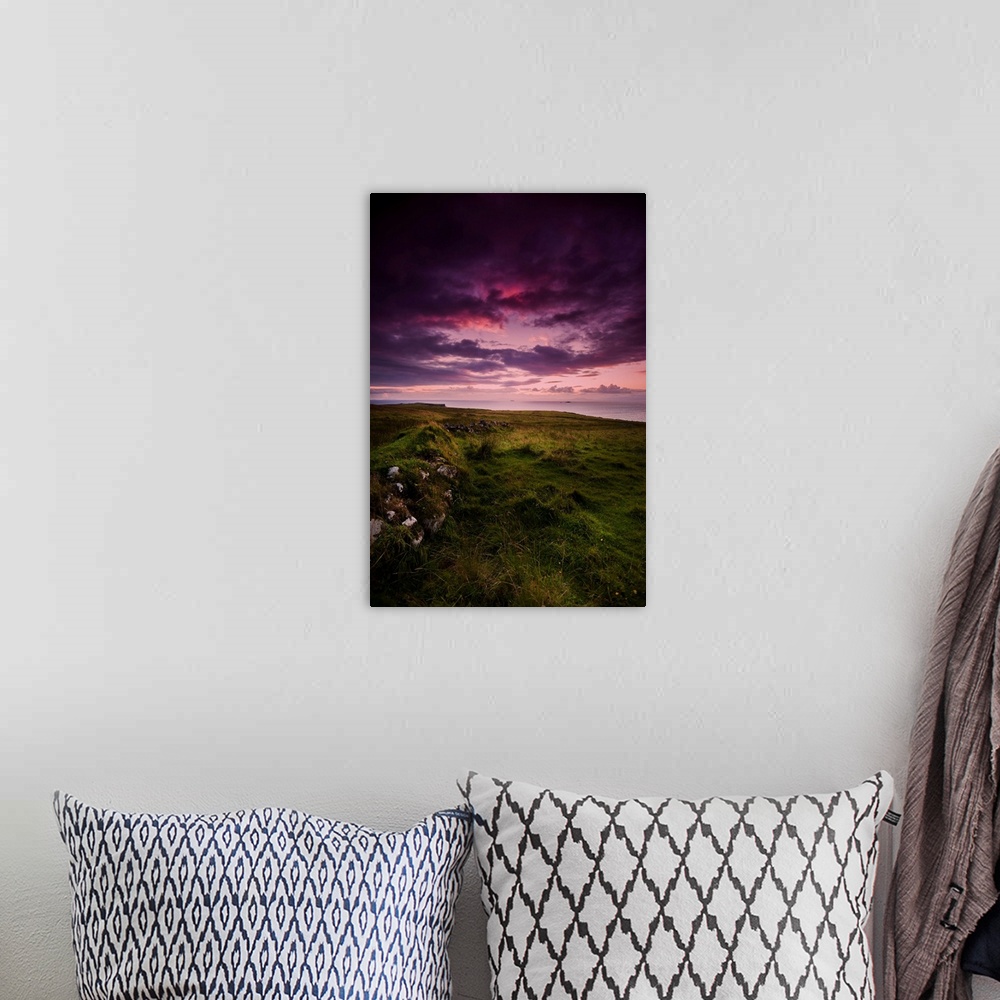 A bohemian room featuring Fine art photo of a dramatic purple sky at sunset over a grassy meadow.