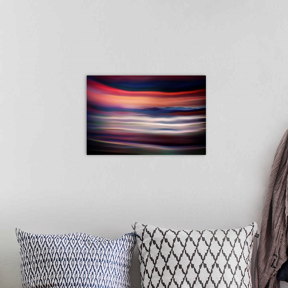 A bohemian room featuring Abstract photograph of blurred and blended colors and flowing lines.