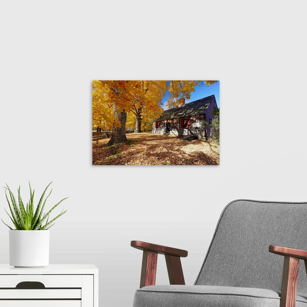 A modern room featuring View of the Historic Wicks Farmhouse Through Colorful Fall Foliage, Jockey Hollow State Park, New...
