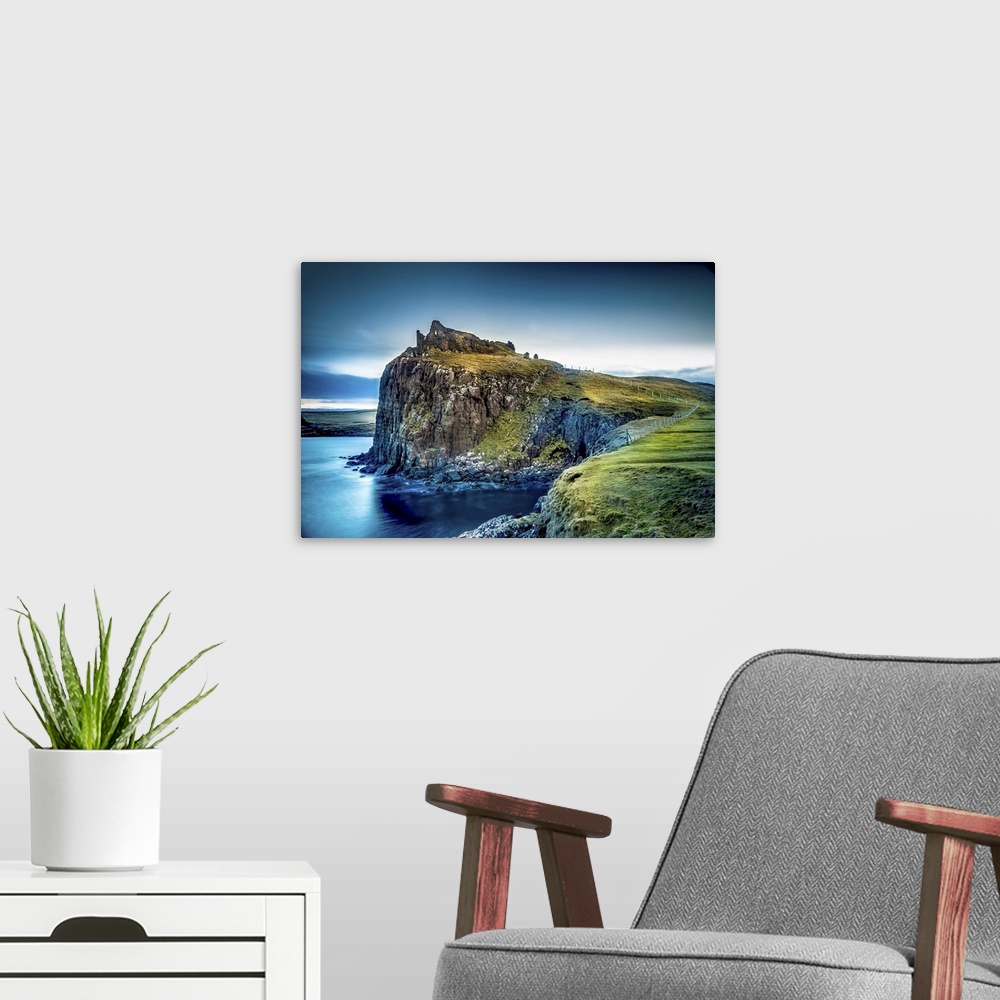A modern room featuring Scottish Castle on hill on the Isle of Skye.