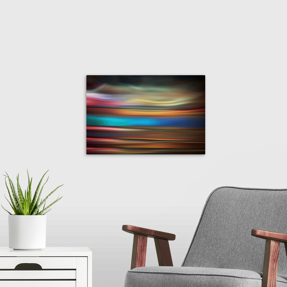 A modern room featuring Abstract photo of smooth waves in varying tones of purple and blue.