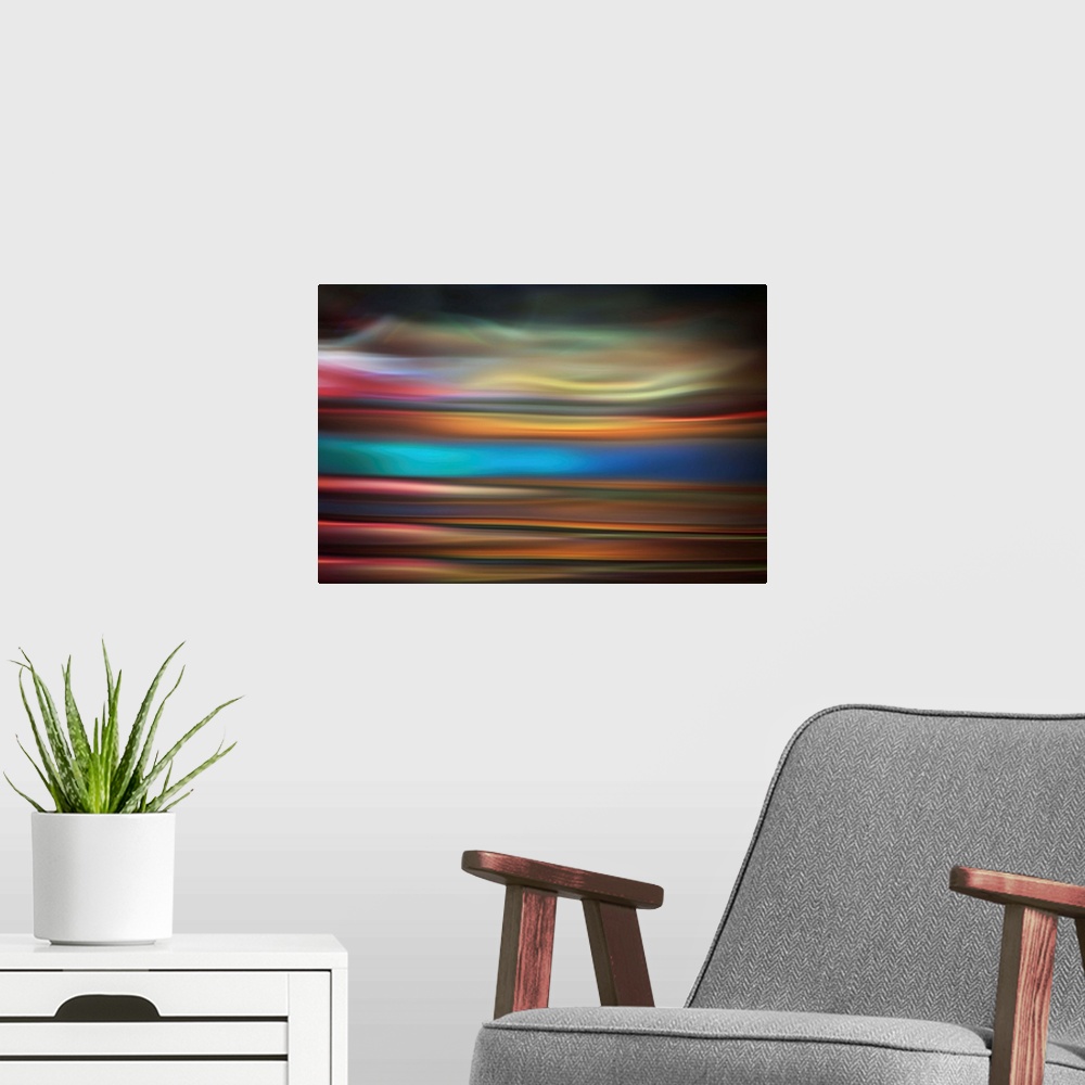 A modern room featuring Abstract photo of smooth waves in varying tones of purple and blue.