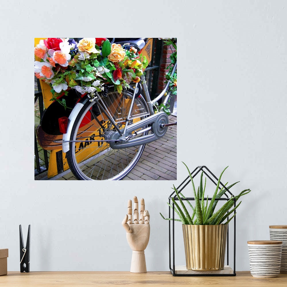 A bohemian room featuring Bicycle covered with flowers in Holland.