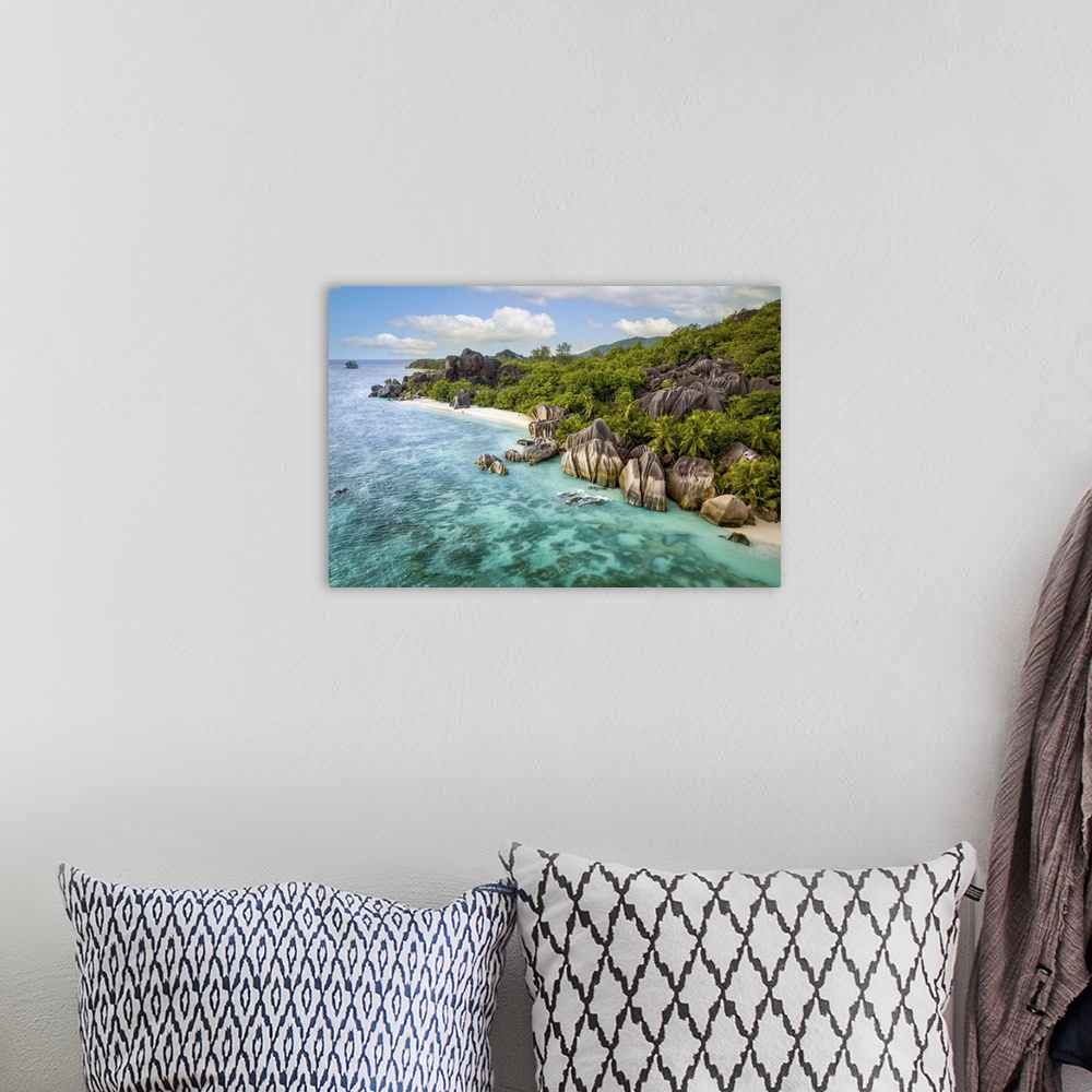 A bohemian room featuring An aerial image of La Digue, a small island in the Seychelles archipelago. The photo was shot wit...