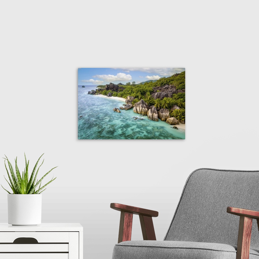 A modern room featuring An aerial image of La Digue, a small island in the Seychelles archipelago. The photo was shot wit...