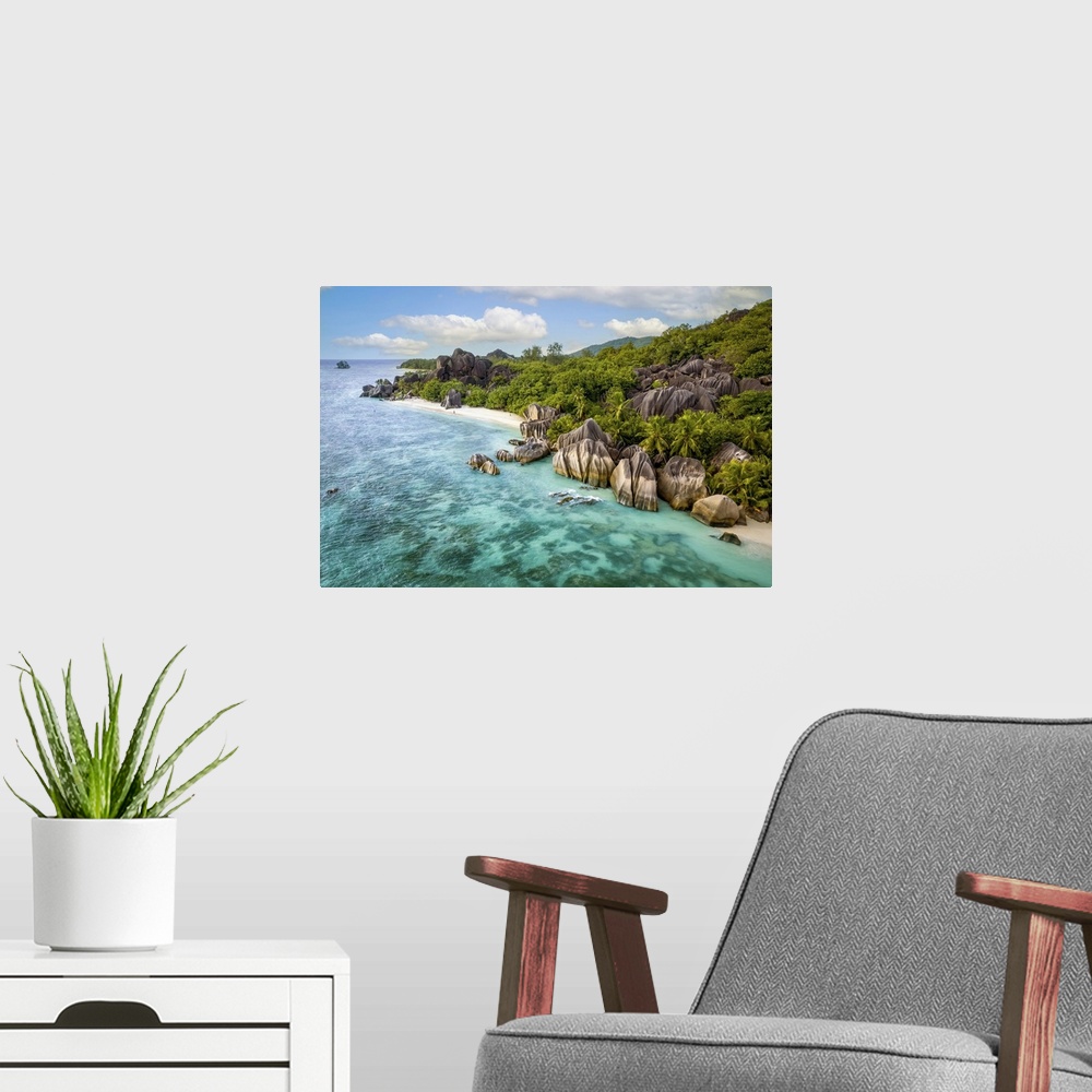 A modern room featuring An aerial image of La Digue, a small island in the Seychelles archipelago. The photo was shot wit...