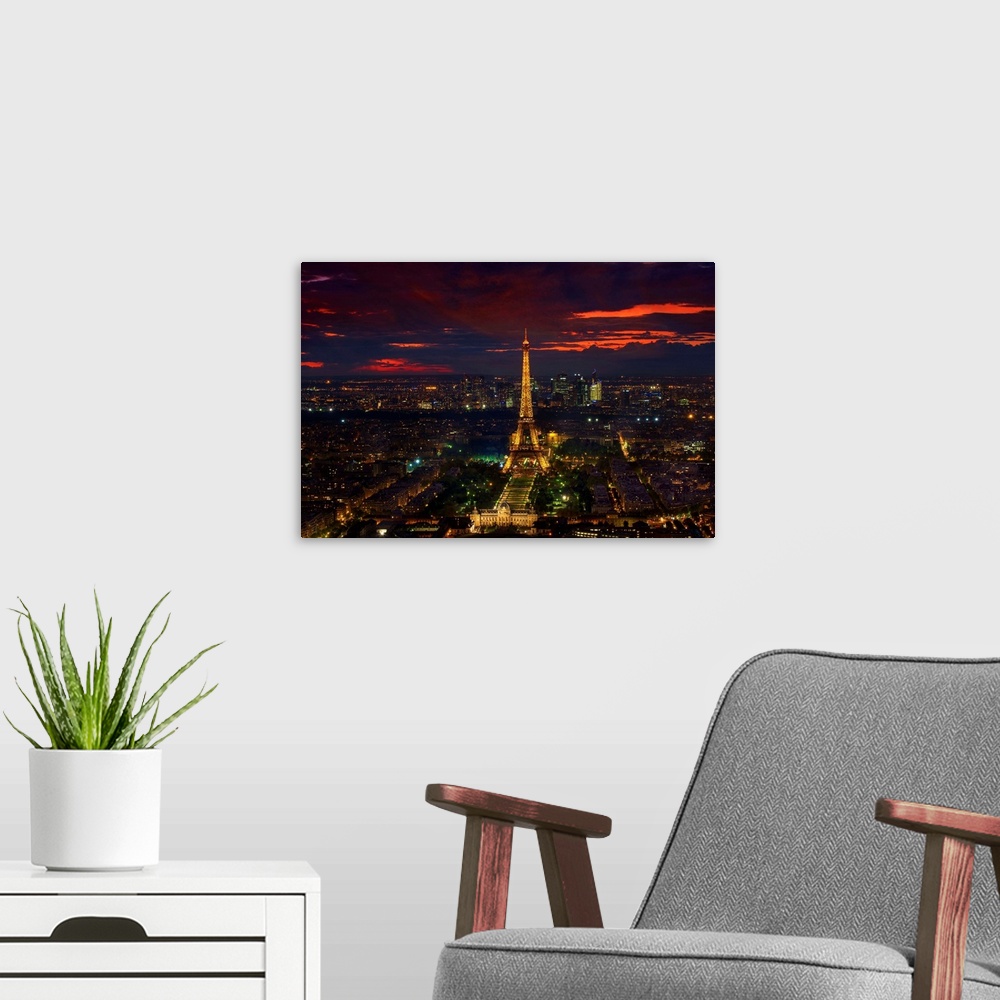 A modern room featuring Eiffel Tower at Sunset