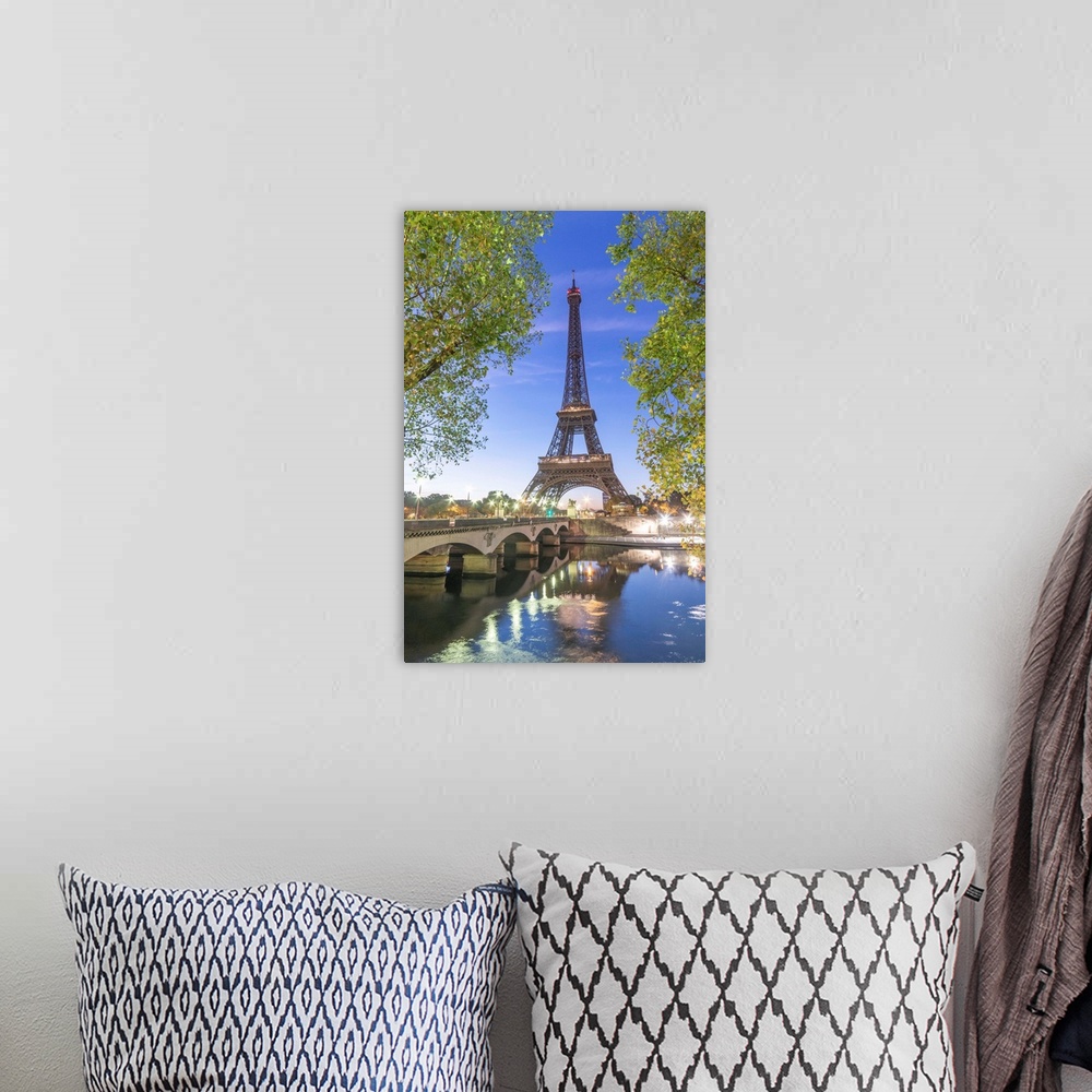 A bohemian room featuring Early morning for the Eiffel tower in Paris, facing the Jena bridge with green trees around and l...