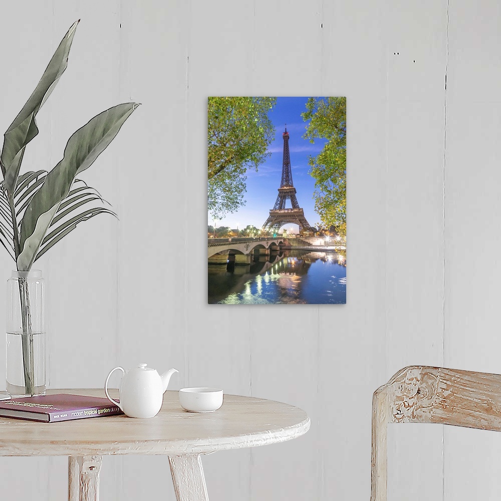 A farmhouse room featuring Early morning for the Eiffel tower in Paris, facing the Jena bridge with green trees around and l...