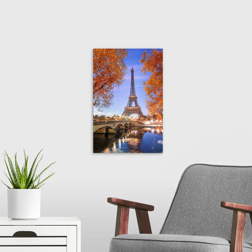 A modern room featuring Early morning for the Eiffel tower in Paris, facing the Jena bridge with green trees around and l...