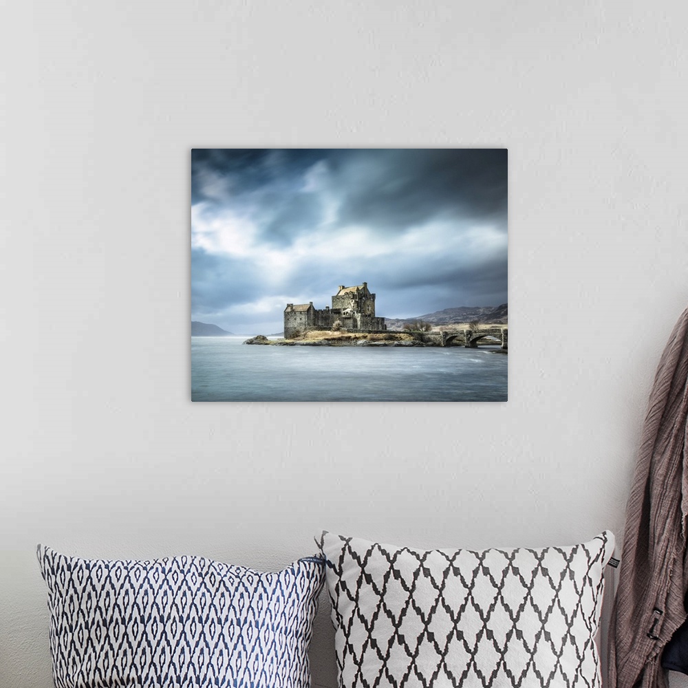A bohemian room featuring Beautiful Scottish Castle in the Scottish Highlands called Eilean Donan with a teal sky and drift...