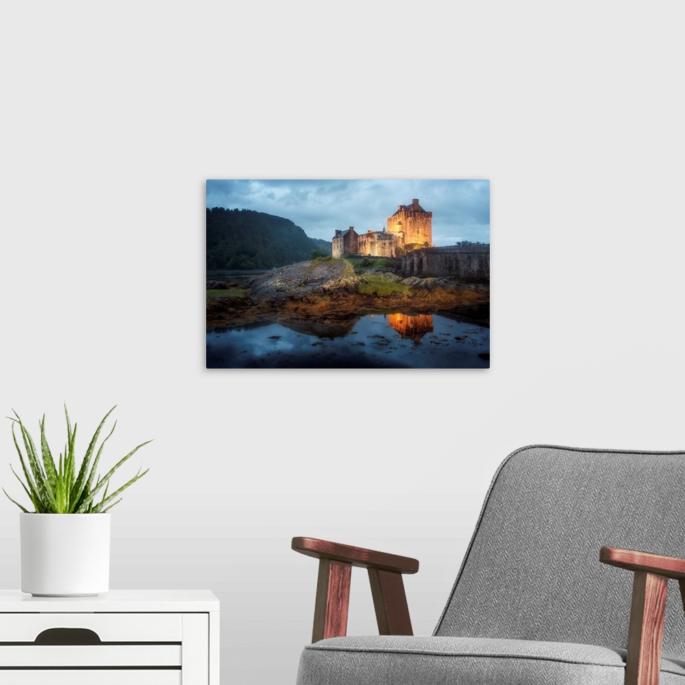 A modern room featuring Photograph of old castle on Eilean Donan Island over Loch Duich, with mountains in the distant ba...