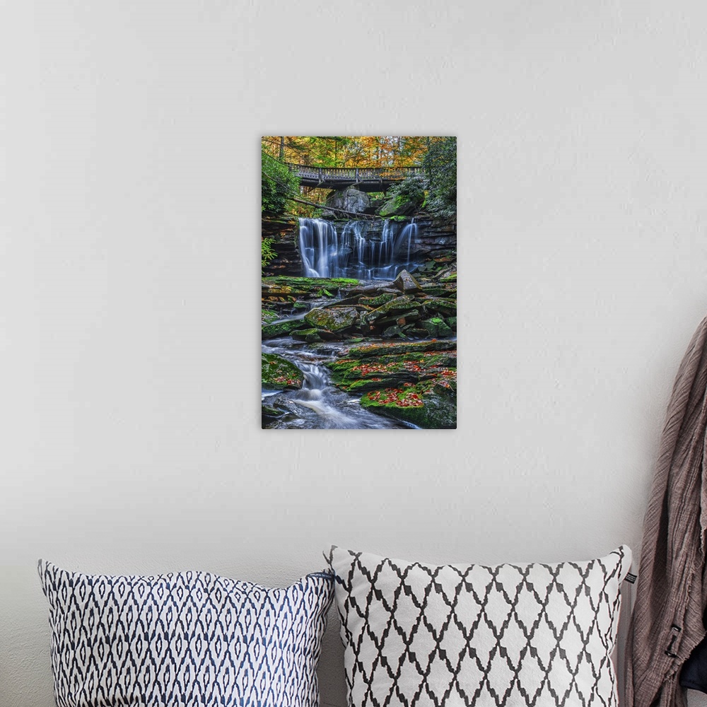 A bohemian room featuring Waterfall over a rocky riverbed at Shays Run in West Virginia.
