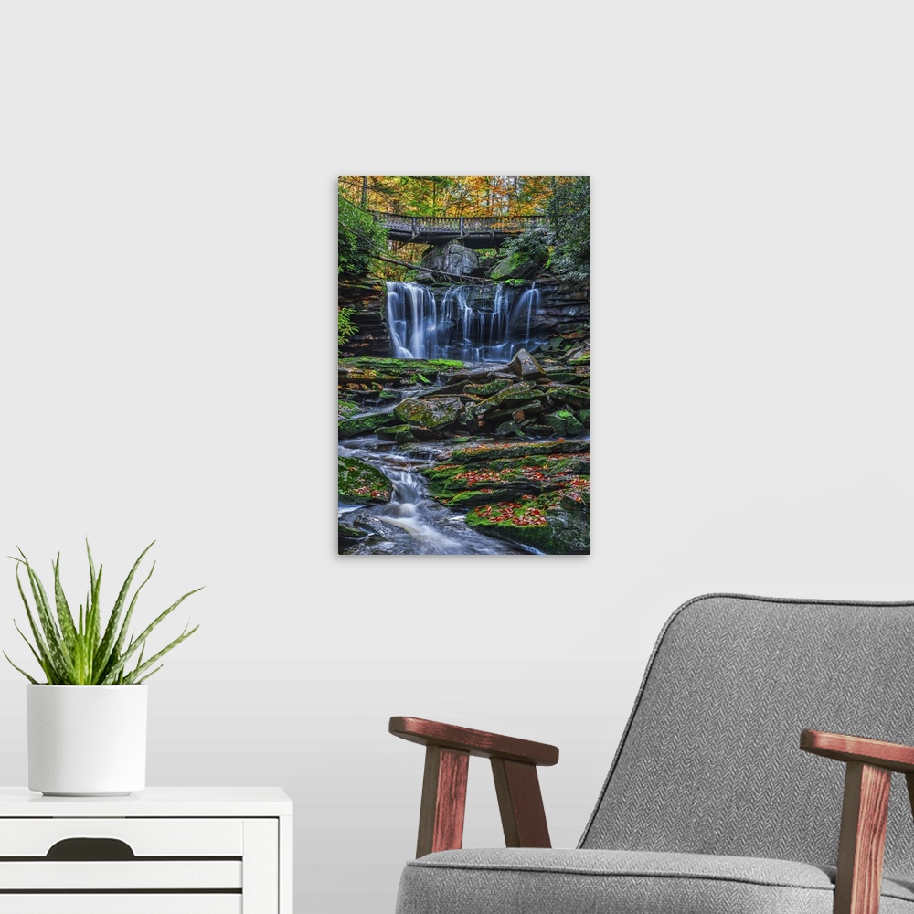 A modern room featuring Waterfall over a rocky riverbed at Shays Run in West Virginia.