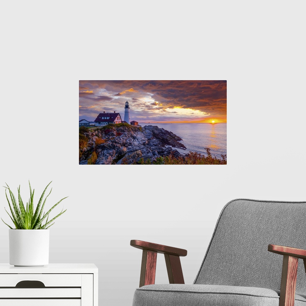 A modern room featuring Portland Head Light is a historic lighthouse in Cape Elizabeth, Maine. A wonderful sunrise with i...