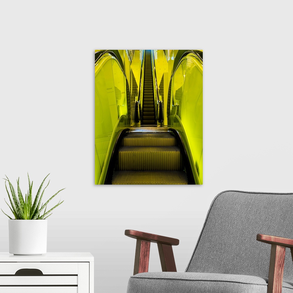 A modern room featuring Abstract view of escalator steps with lime green paneling.