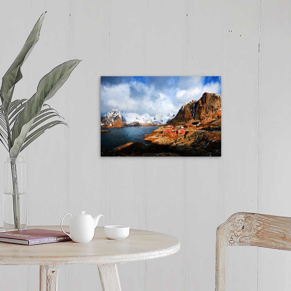 A farmhouse room featuring A photograph of a mountainous landscape with a small red building village in the distance.