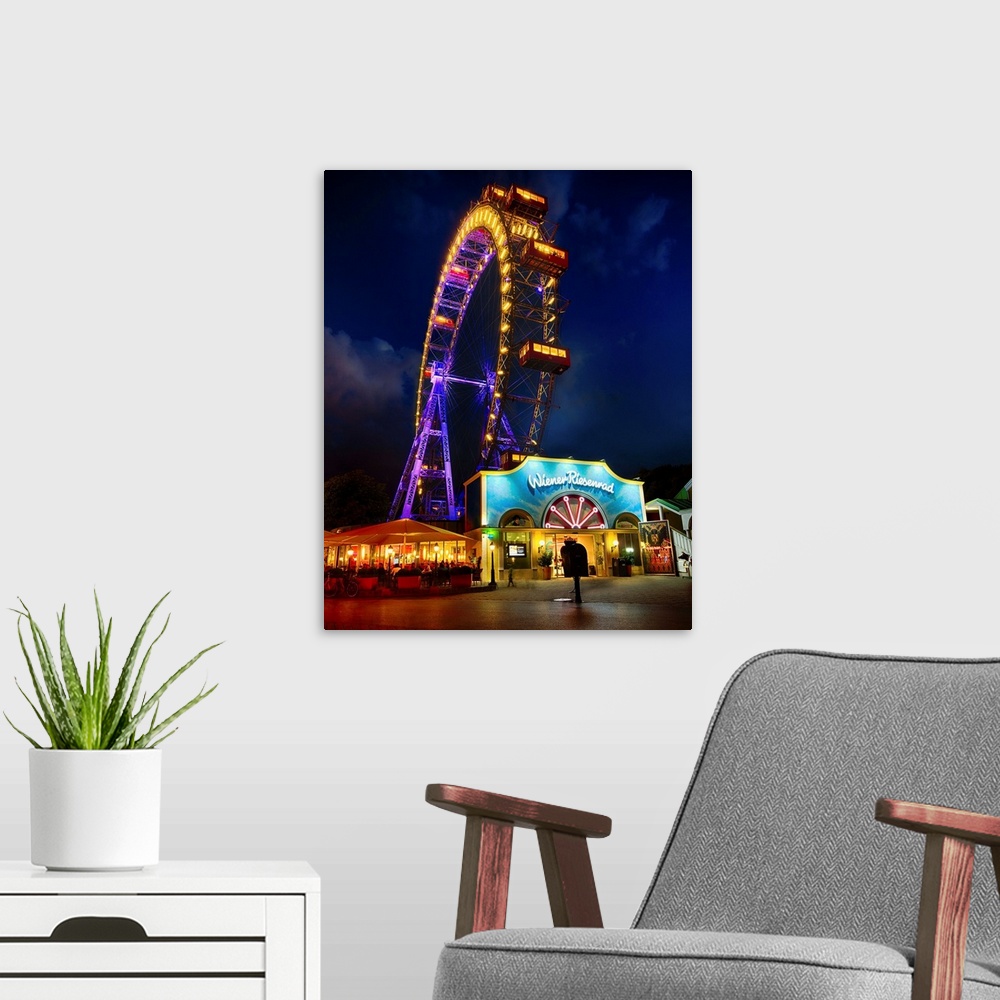 A modern room featuring The Giant Ferris Wheel of Vienna at Night.