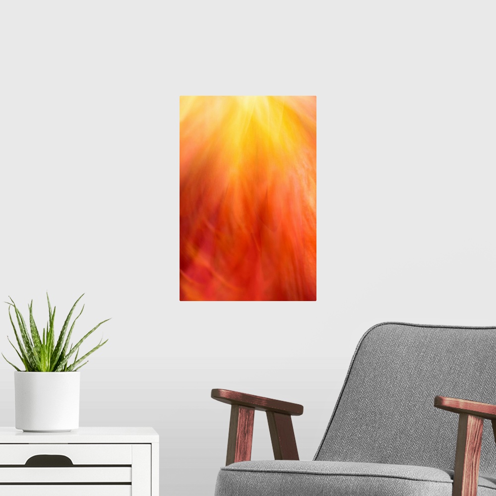 A modern room featuring A contemporary golden orange energetic abstract of swirling patterns.
