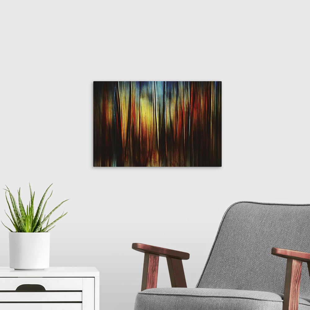 A modern room featuring Abstract artistic photograph of vertical lines of earthy and cool tones.