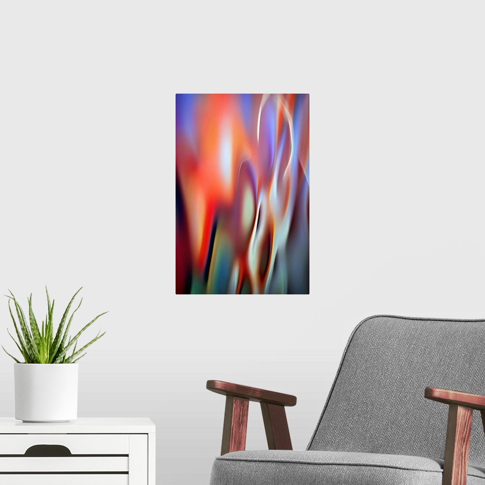 A modern room featuring Abstract photograph of colorful flames from a fire.