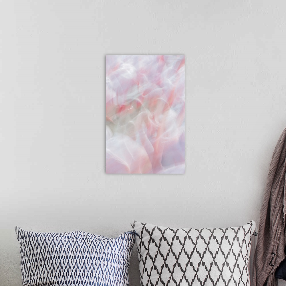 A bohemian room featuring Abstract photo of a cluster of flamingos that has been edited to illustrate a motion blur effect.