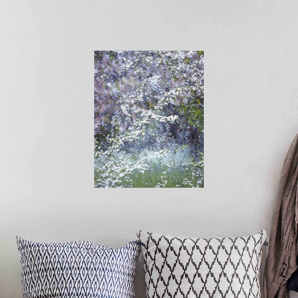 A bohemian room featuring A photograph of flowers in bloom in a garden.