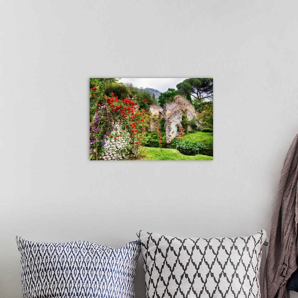 A bohemian room featuring Garden with historic ruins and blooming flowers, Latina, Italy.