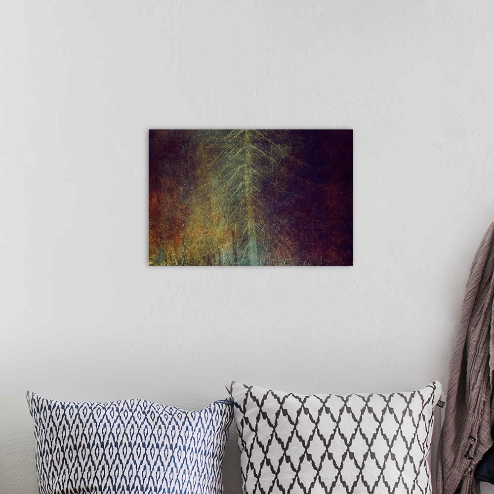 A bohemian room featuring An abstracted image of trees in a surreal forest of iridescent pinks, bronze, reds, golds and blues.