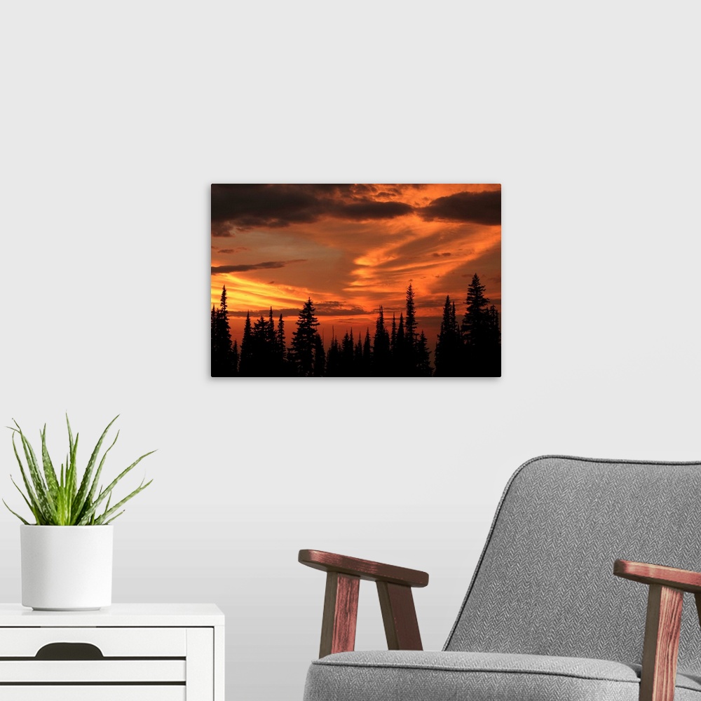 A modern room featuring The sky glows orange and gold from Miner's Ridge at sunset. North Cascades, Washington.