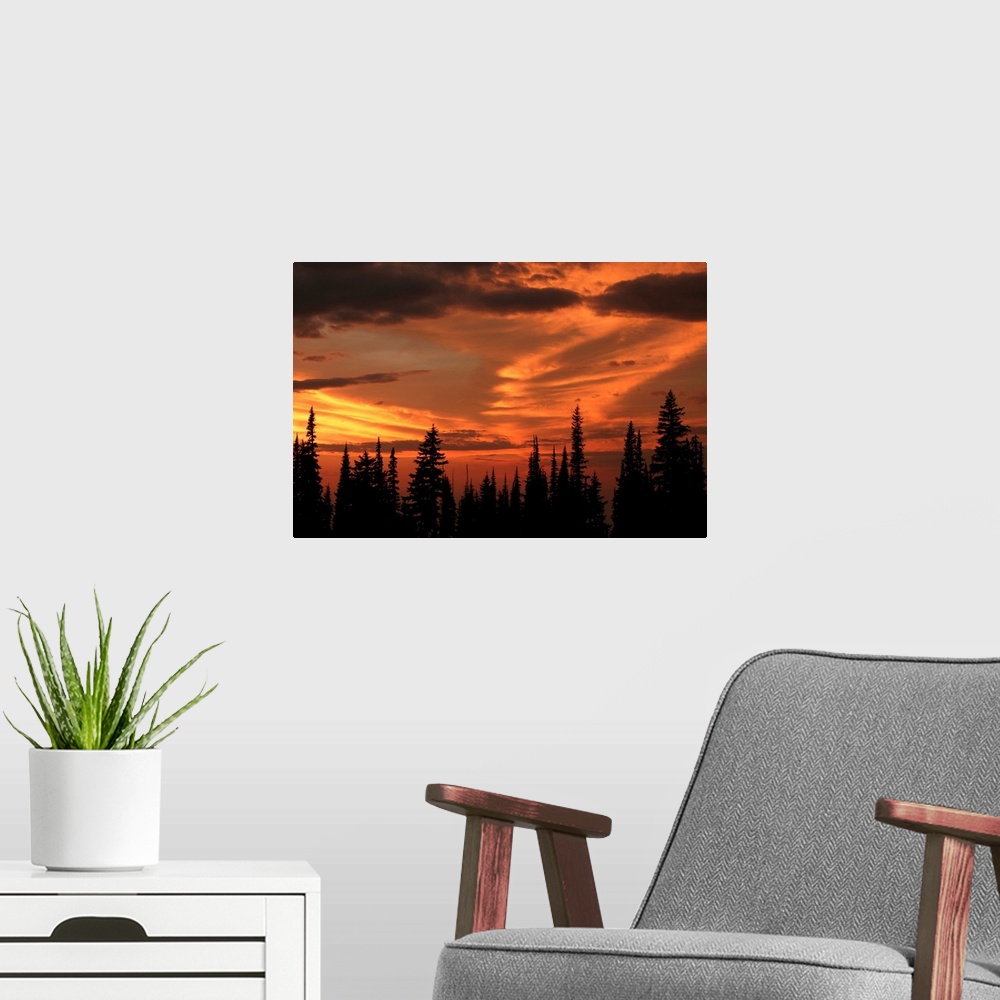 A modern room featuring The sky glows orange and gold from Miner's Ridge at sunset. North Cascades, Washington.