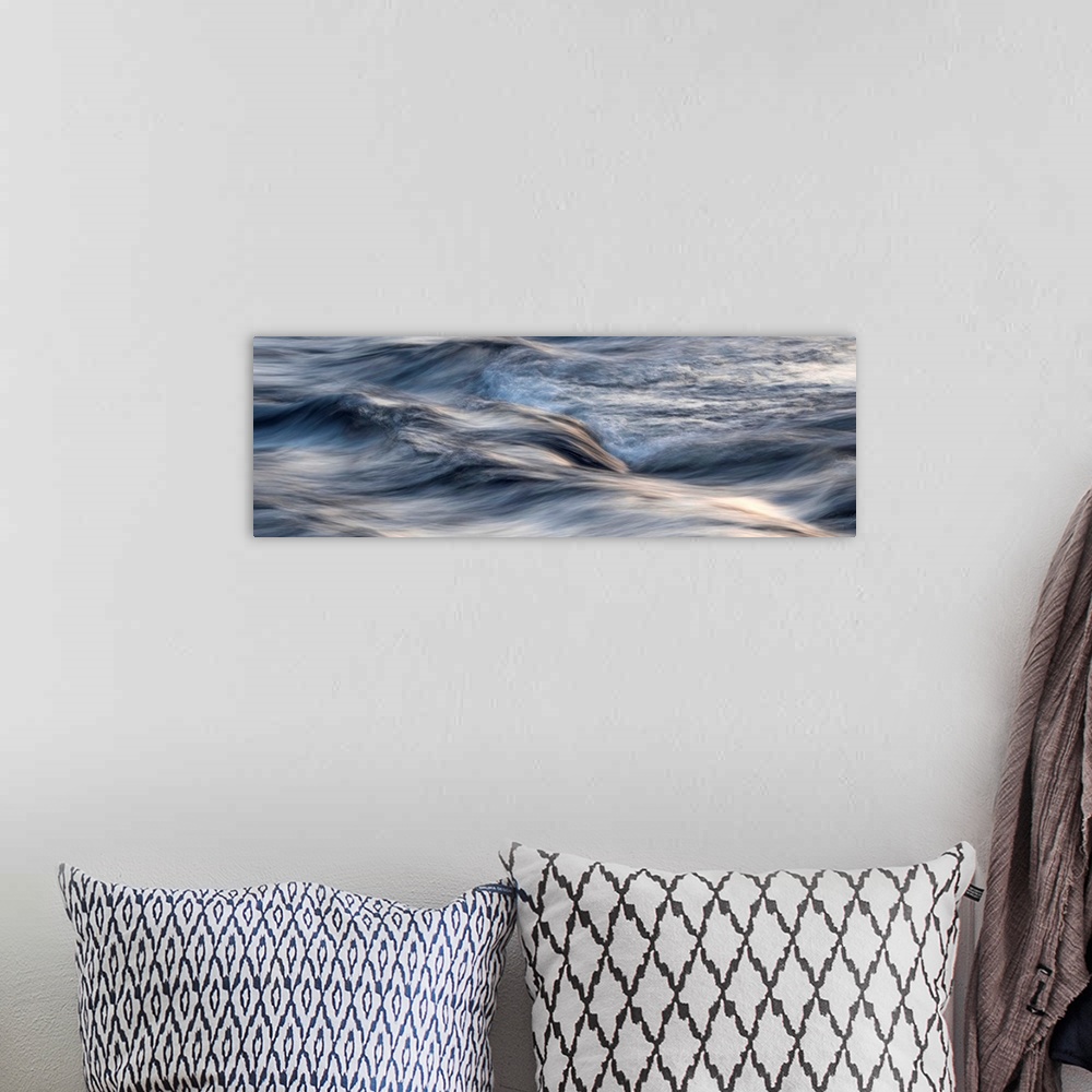 A bohemian room featuring Photograph of blurred motion waves of water rustling.