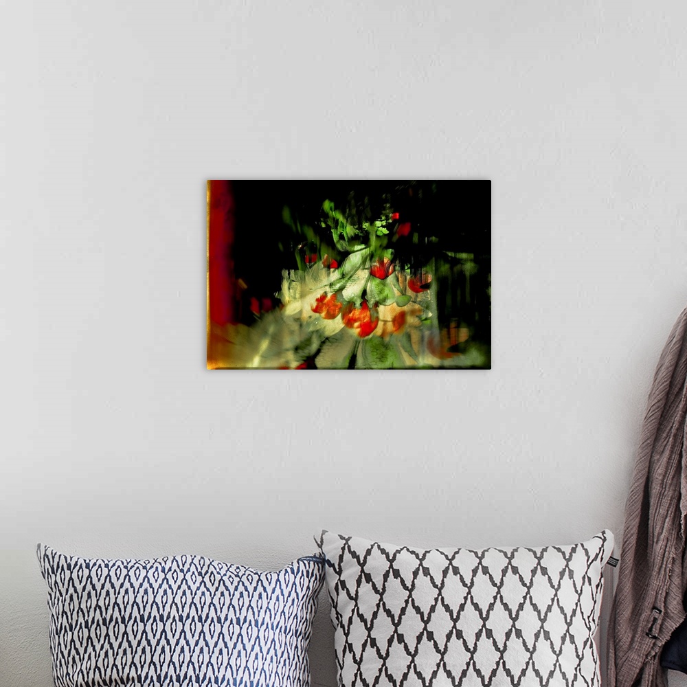 A bohemian room featuring Abstract photograph of red tulips created with multiple layers of images.