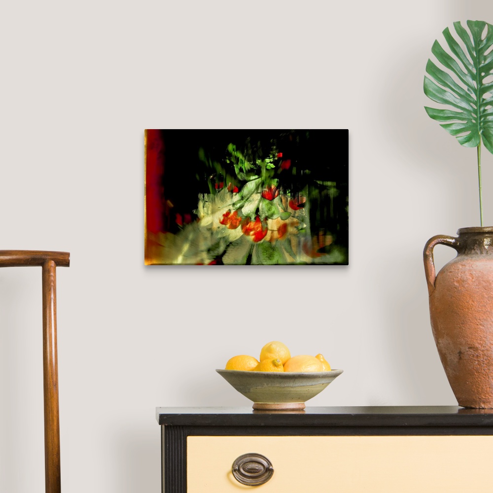 A traditional room featuring Abstract photograph of red tulips created with multiple layers of images.