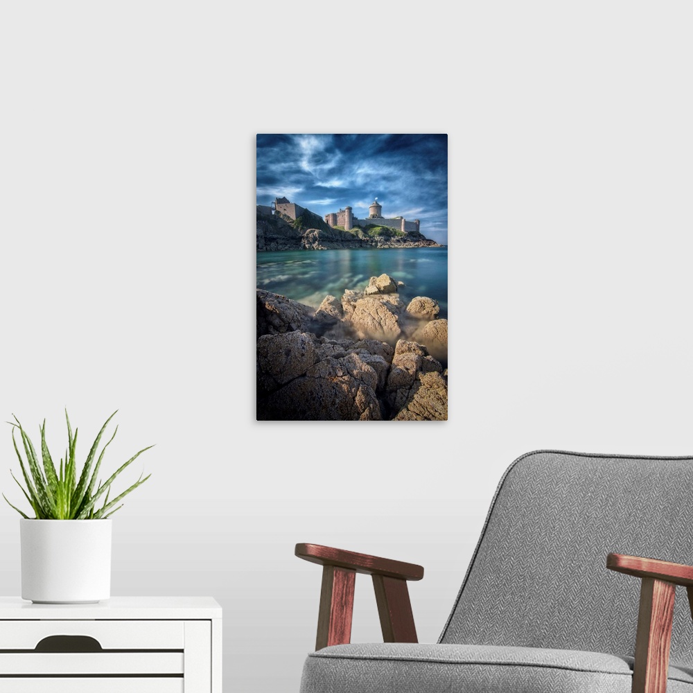 A modern room featuring Vertical view of a castle facing the sea and the rock, the place of Fort la Latte, in Brittany in...