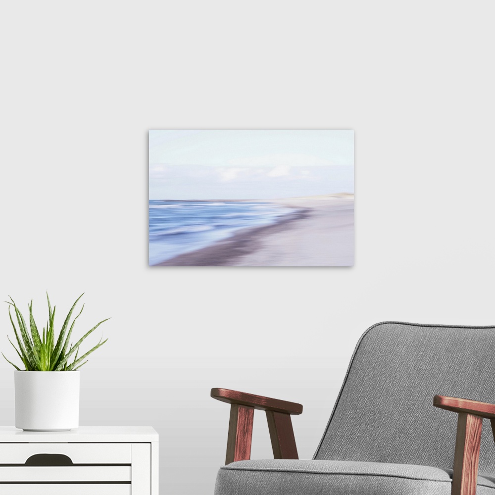 A modern room featuring Artistically blurred photo. The waves find a place to rest on the North Sea beach of North Jutlan...