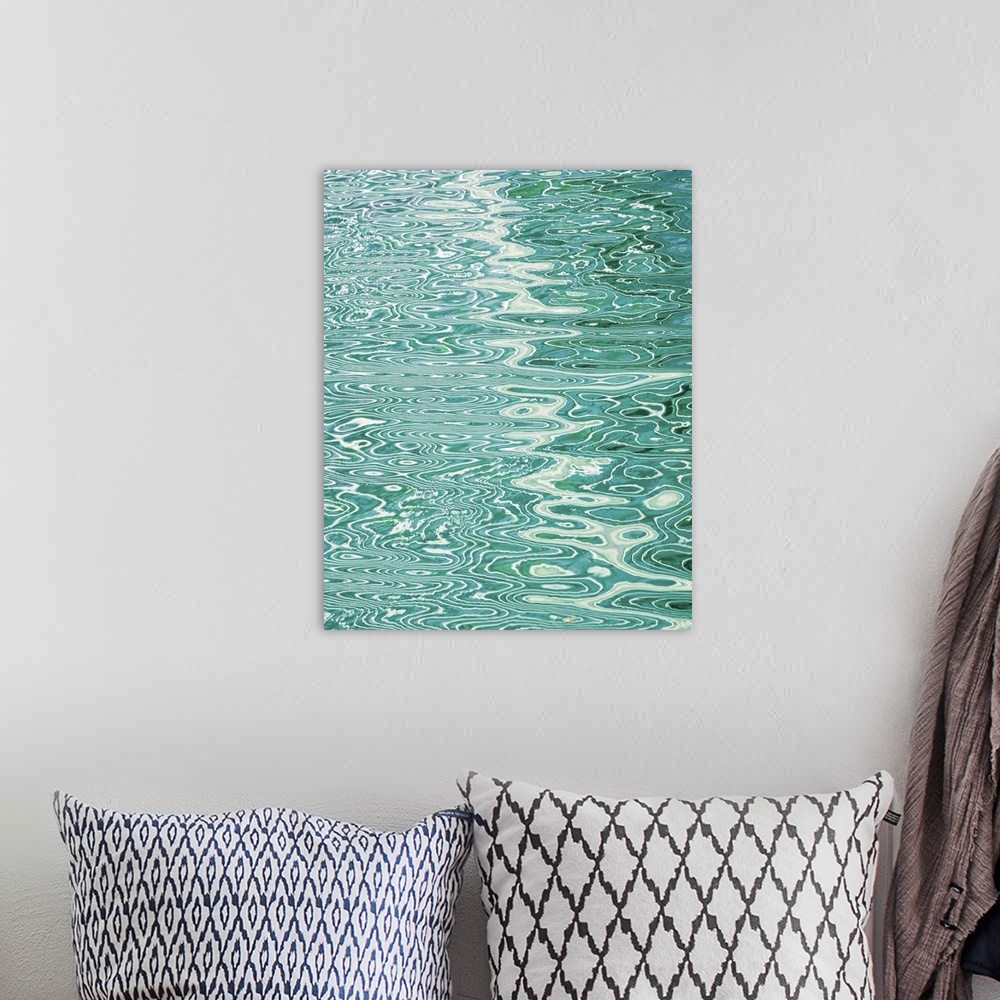 A bohemian room featuring Abstract pattern created by rippling water reflecting lines in a pool.