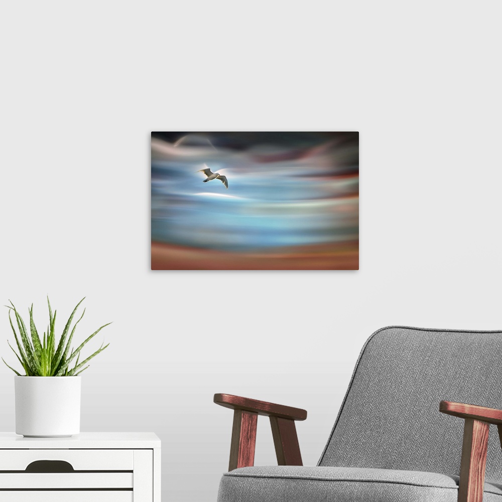 A modern room featuring Abstract photograph of blurred and blended colors and flowing lines with a bird in mid-flight.