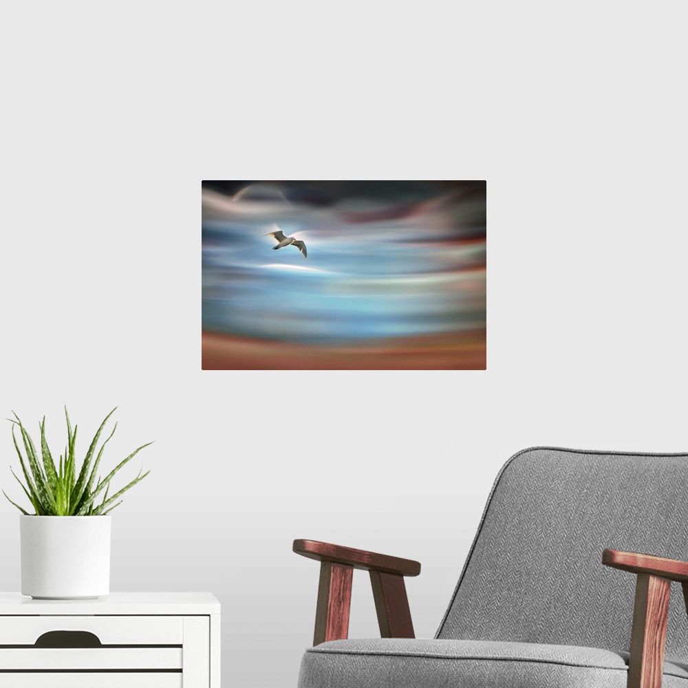 A modern room featuring Abstract photograph of blurred and blended colors and flowing lines with a bird in mid-flight.