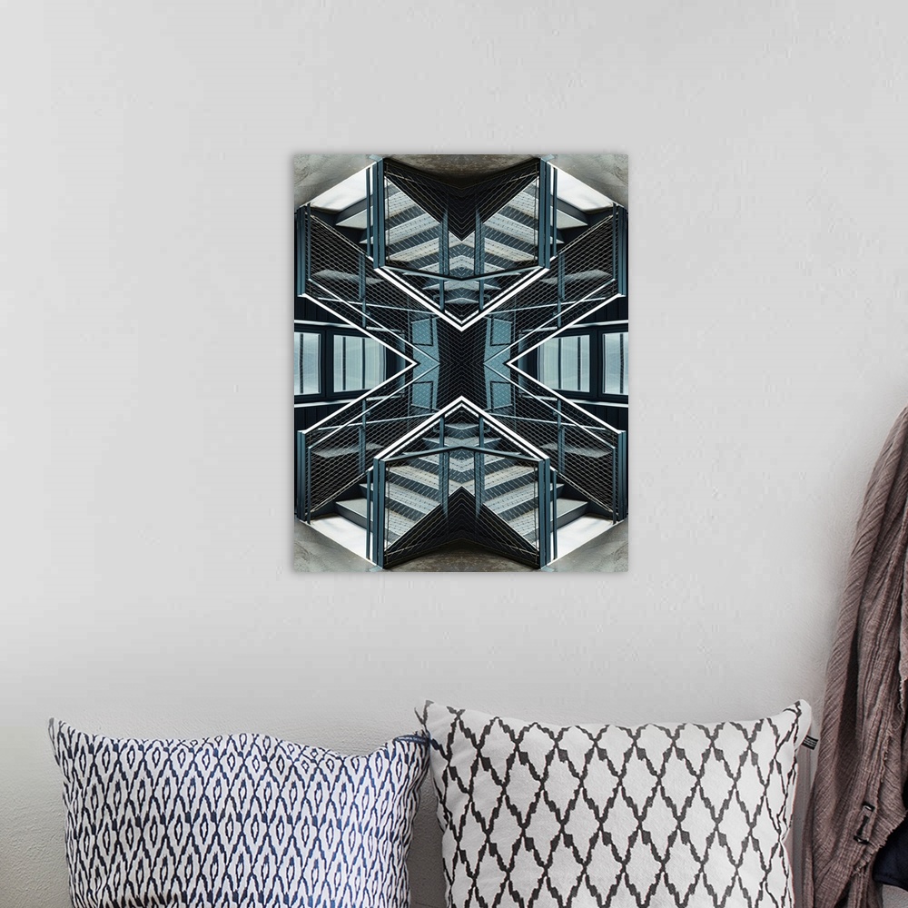 A bohemian room featuring An Escher-like abstract geometric photograph using a kaleidoscopic technique featuring strident l...