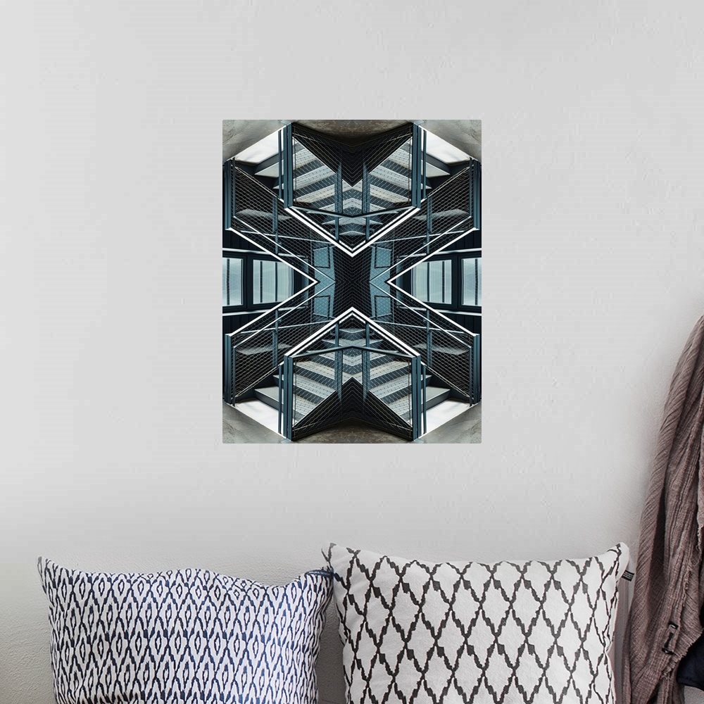 A bohemian room featuring An Escher-like abstract geometric photograph using a kaleidoscopic technique featuring strident l...