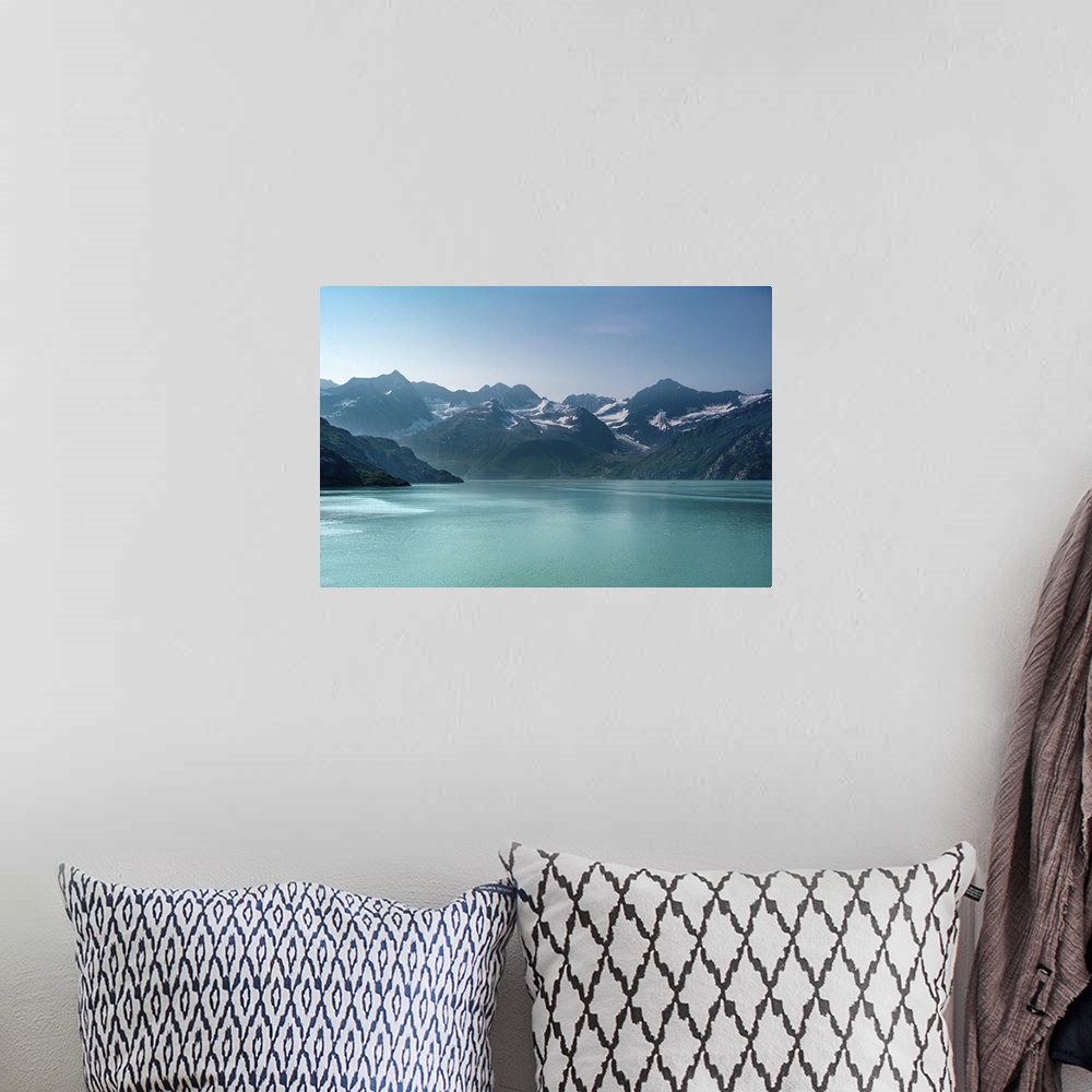 A bohemian room featuring Beautiful Alaskan mid-morning scene of snow capped mountains rising out of luminous aquamarine bl...